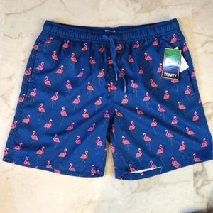 Trinity pink flamingo swim trunks.